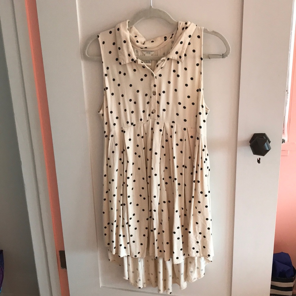 White womens baby doll dress with black polka dots